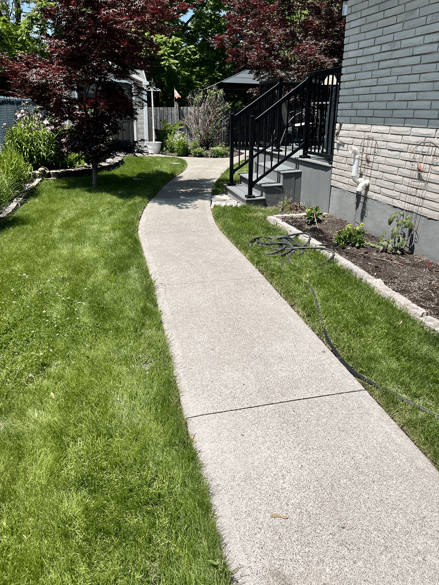 Pressure washing after photo with a brighter and cleaner surface
