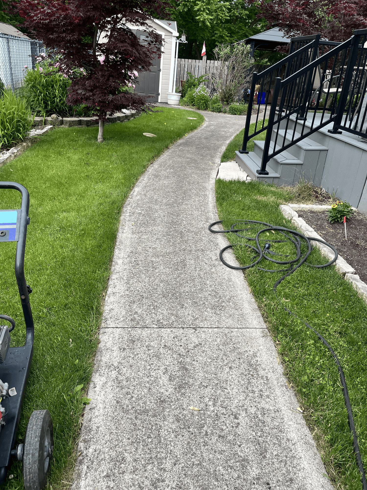 Pressure washing before photo with visible surface dirt and discoloration