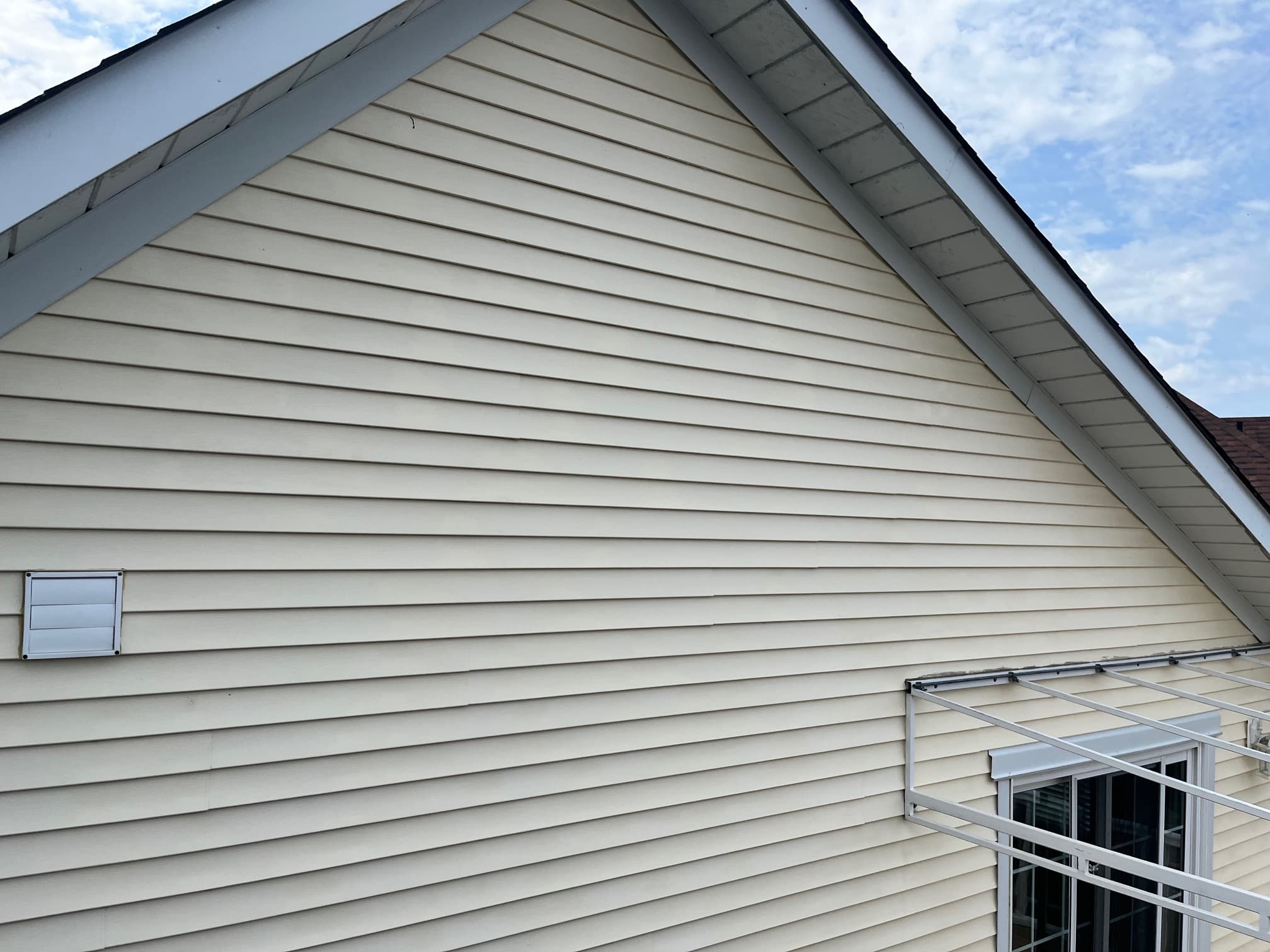 Soft washing after cleaning with refreshed siding